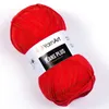 A ball of red yarn with a label. Produktbild-Vorschau