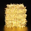 A tightly wound coil of warm white LED string lights against a black background. Produktbild-Vorschau