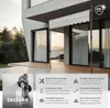 A white awning is installed on a modern house with large glass doors, extending over a wooden deck. The image is split, with the top showing the awning in use and the bottom featuring product details and a close-up of the mounting mechanism. Náhled obrázku produktu