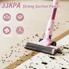 A pink cordless vacuum cleaner is shown on a wooden floor with scattered debris, highlighting its suction power and features. Produktbild-Vorschau