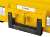 A close-up view of a yellow tool case with a black handle and a small yellow padlock. Voir les images du produit