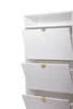 A close-up of a white shoe cabinet with three doors. Náhľad obrázku produktu
