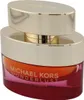 Michael Kors Wonderlust Sensual Essence im Glasflakon mit Farbverlauf von Apricot zu Pink und großer goldfarbener Kappe mit spiegelnder Oberfläche. Produktbild-Vorschau