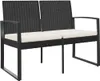 A black rattan two-seater garden bench with cream cushions, shown against a white background. Náhled obrázku produktu