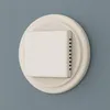 A close-up shot of a white digital thermostat mounted on a blue wall. Anteprima dell’immagine prodotto