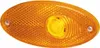 An orange oval side marker light with a textured surface and a central lens. Podgląd zdjęcia produktu