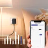 A smart plug is shown plugged into a wall socket, connected to a lamp. A smartphone displays an energy monitoring app, and a bar chart illustrates energy consumption. Produktbild-Vorschau