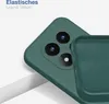A close-up shot of a green phone case, partially covering a phone with a camera module. Produktbild-Vorschau