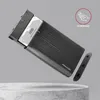 A 3.5-inch external HDD enclosure with a hard drive partially inserted, shown at an angle on a textured surface. Produktbild-Vorschau