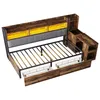 A bed frame with storage and shelving, shown from a diagonal angle against a white background. Podgląd zdjęcia produktu