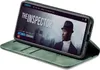 A green flip cover phone case is shown with a smartphone displaying a movie poster. Produktbild-Vorschau