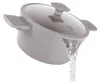 A gray pot with a glass lid is shown with water pouring out of it. Podgląd zdjęcia produktu