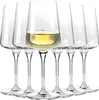 A set of six clear wine glasses, with one glass filled with white wine. Produktbild-Vorschau