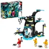 A LEGO Hidden Side set featuring a haunted tree and figures, with its packaging in the background. Náhled obrázku produktu