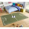 A child's bedroom with a bed, desk, and a rug designed like a soccer field. Anteprima dell’immagine prodotto