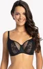 A woman is wearing a black lace balconette bra against a white background. Produktbild-Vorschau