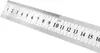 A close-up shot of a metal ruler with markings and numbers. Podgląd zdjęcia produktu