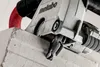 A close-up of a Metabo wall chaser cutting into a concrete block. Náhľad obrázku produktu