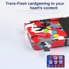 A handheld gaming console with a camouflage pattern, showing a Trans-Flash card inserted and a screen displaying game icons. Produktbild-Vorschau