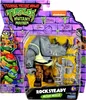 A Teenage Mutant Ninja Turtles action figure in its packaging. Produktbild-Vorschau