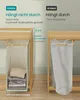 Comparison of two laundry baskets, one labeled 'Unsere' (Ours) and the other 'Andere' (Others), highlighting a feature of the 'Ours' basket. Produktbild-Vorschau