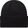 A black knitted beanie hat is shown against a white background. Podgląd zdjęcia produktu