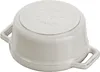 The bottom of a small, white Staub mini cocotte pot is shown, with the text "MADE IN FRANCE" embossed on the base. Podgląd zdjęcia produktu