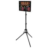 A digital scoreboard on a tripod stand, displaying game scores and time. Podgląd zdjęcia produktu
