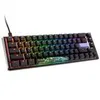 A close-up, angled view of a compact mechanical keyboard with RGB lighting. Produktbild-Vorschau