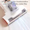 A close-up view of a white handheld vacuum cleaner with a transparent dustbin, showing dust and debris inside. Blue light rays emanate from the cleaning head, suggesting suction or cleaning action. Text overlays describe its features. Produktbild-Vorschau