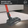 A close-up of a vacuum cleaner head with LED lights on a carpet and hard floor. Produktbild-Vorschau