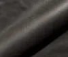 A close-up view of dark gray microfiber fabric, showing its texture and subtle sheen. Produktbild-Vorschau