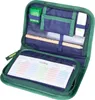 An open pencil case with school supplies inside. Produktbild-Vorschau