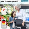 A woman and a child are looking at a shopping trolley in a supermarket aisle. Produktbild-Vorschau