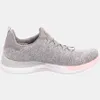 Side view of a single women's sneaker. Voir les images du produit
