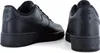 Two black Nike Air Force 1 '07 sneakers shown from different angles against a white background. Voir les images du produit