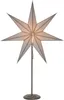 A star-shaped lamp on a stand. Podgląd zdjęcia produktu