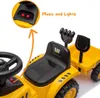 Close-up view of a yellow CAT tractor ride-on toy with a trailer, highlighting its features. Náhľad obrázku produktu