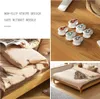 A collage of images showing bedding clips being used to secure a duvet to a duvet cover, and a close-up of the clips. Produktbild-Vorschau