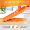 A close-up of an orange vegetable slicer with shredded carrots on a wooden cutting board, with instructional graphics at the bottom. Anteprima dell’immagine prodotto