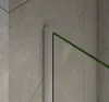 A close-up view of a shower enclosure corner, showing the metal frame and a section of the glass panel. Produktbild-Vorschau