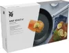 A product box for a WMF frying pan, featuring an image of a cooked salmon fillet with lemon and herbs in a frying pan. Produktbild-Vorschau