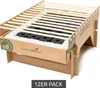 A disposable cardboard grill with charcoal and wooden skewers, ready for use. Produktbild-Vorschau