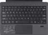 A top-down view of a black keyboard with a trackpad. Náhled obrázku produktu