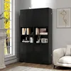 A black storage cabinet with multiple shelves and doors, displayed in a room next to a window and a sofa. Podgląd zdjęcia produktu