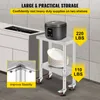 A stainless steel work table with wheels in a kitchen setting, featuring a rice cooker and plates. Podgląd zdjęcia produktu