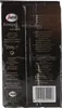 The image shows the back of a coffee package with product information and a barcode. Produktbild-Vorschau