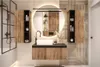 A modern bathroom with a vanity, sink, mirror, and shower. Produktbild-Vorschau