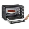 A black oven with a pie inside and the door open. Voir les images du produit