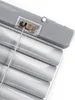 A close-up view of the top mechanism and slats of a window blind. Produktbild-Vorschau